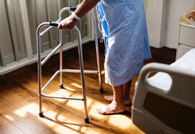 Photo of an adult using a walker