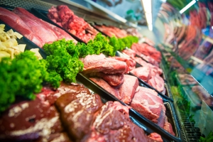 Red meat in a refrigerated display case